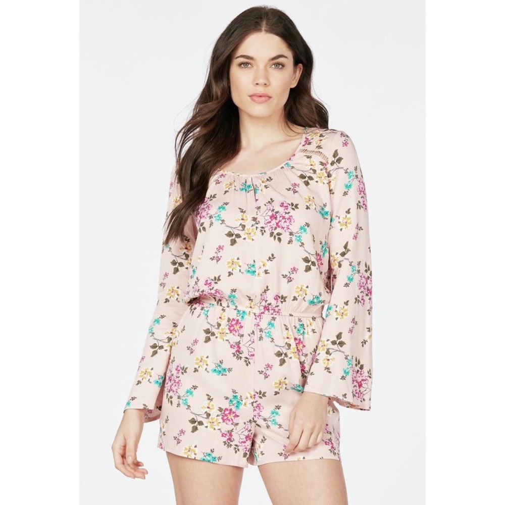 New with tags.  Bell Sleeve Romper